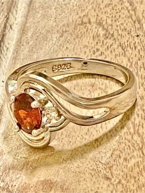 Sterling Silver Garnet Red Stone Swirl Ring with Accent Stones